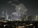 ينمو الدخان بعد هجوم صاروخي في تل أبيب ، إسرائيل ، الجمعة ، 13 يونيو 2025.