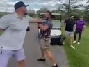 Two men square off during a fight on a golf course. The man on the left reportedly is ex-NHL enforcer Nick Tarnasky.