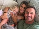 Ryan Lochte and new girlfriend Molly Gillihan take a selfie on a couch with a young relative.