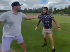 Two men square off during a fight on a course. The man on the left reportedly is ex-NHL enforcer Nick Tarnasky.