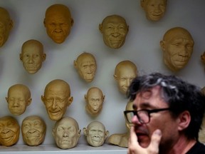 Dutch twins Alfons and Adrie Kennis specialise in lifelike reconstructions of prehistoric humans. (Nicolas TUCAT/AFP)