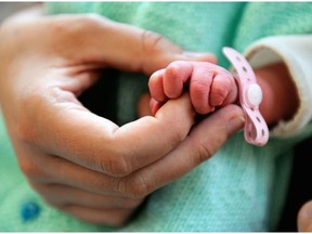 A new IVF technique using DNA from three people successfully reduced the risk that eight babies inherited genetic diseases from their mothers.
