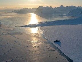 The Kronprins Haakon icebreaker carrying the scientists near Spitzbergen and its glaciers. (Olivier MORIN/AFP)