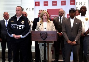 (Front L-R) NYPD Chief of Department John M. Chell, NYPD Commissioner Jessica Tisch and New York City Mayor Eric Adams and City officials hold a press conference at the David H. Koch Center following a shooting in Midtown in which four people including a police officer were killed, on July 28, 2025 in New York City.