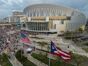An aerial view shows people queing outside the Coliseo de Puerto Rico to attend the first night of Bad Bunny’s highly anticipated residency in San JuanRicardo ARDUENGO/AFP
