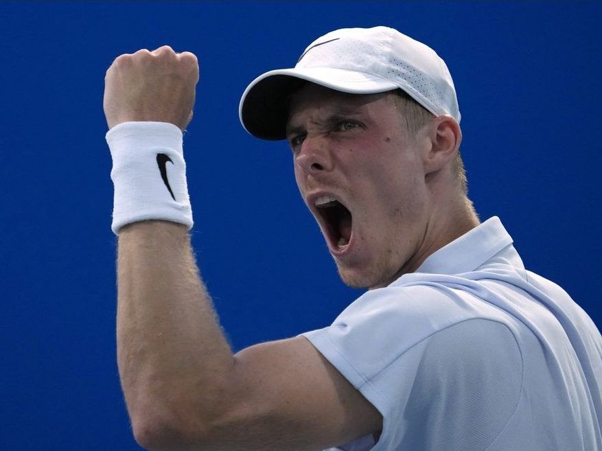 Denis Shapovalov of Canada reacts during his first round match against Roberto Bautista Agut of Spain at the Australian Open tennis championship in Melbourne, Australia, Tuesday, Jan. 14, 2025. 