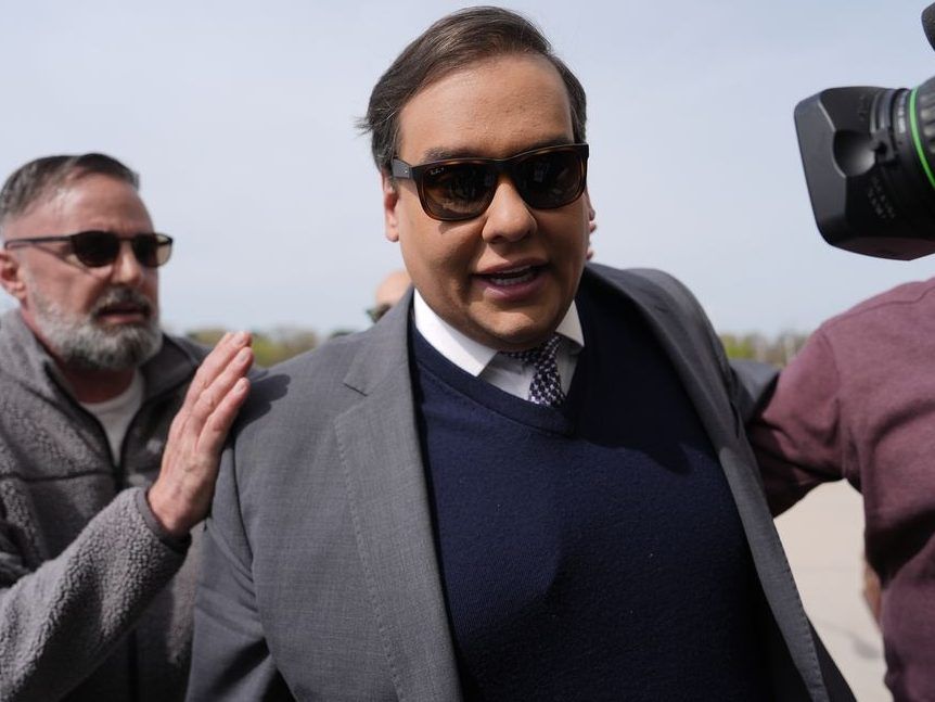 Former U.S. Rep. George Santos arrives at federal court for sentencing, April 25, 2025, in Central Islip, N.Y.