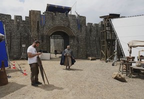 Workers and artists on the set of the Robin Hood