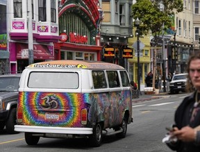 A tour van featuring a painting of musician Jerry Garcia
