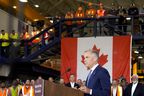 Prime Minister Mark Carney delivers a statement as he Walters Group Steel fabrication plant in Hamilton, Ont., Wednesday, July 16, 2025.