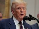U.S. President Donald Trump speaks during an executive order signing ceremony in the Roosevelt Room of the White House in Washington, D.C., Thursday, July 31, 2025.