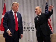 Mark Carney gestures while speaking with Donald Trump