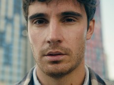 Close up man Caucasian unhappy worried alone guy sad face expression headshot outdoors pensive frustrated male customer client tourist businessman upset looking at camera serious portrait in city town