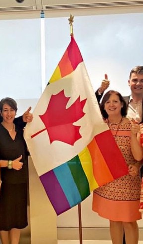 Canadian flag with Pride colours