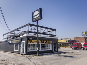 The outside of a Burgers Priest restaurant.