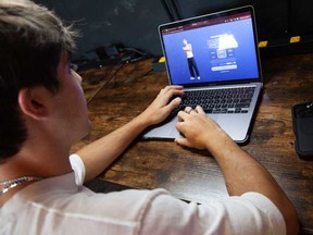 Bruce Perry, 17, demonstrates the possibilities of artificial intelligence by creating an AI companion on Character AI, Tuesday, July 15, 2025, in Russellville, Ark.