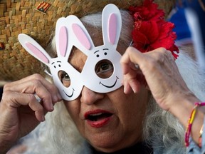 A Bad Bunny wears a rabbit mask as fans wait to see the first concert of his residencyRicardo ARDUENGO/AFP