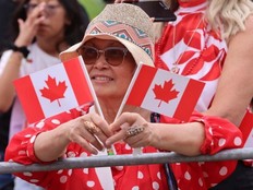 There was a sea of red-and-white hats and other clothing as thousands of Canada Day celebrants of all ages took over Queen’s Park.
