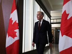 070225-CANADA_CARNEY