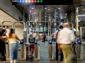Commuters during morning rush hour at the Fulton Center subway station in New York.