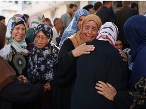 Gaza’s civil defence agency said at least 12 people were killed in the Israeli strike on the school. (Omar AL-QATTAA/AFP)