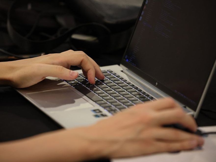 An attendee takes part in a hackathon on the opening day of the European Blockchain Convention at the Fira de Barcelona in Barcelona, Spain, on Wednesday, Oct. 25, 2023. 