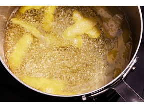 Making syrup with lemon peels for Classic Lemonade.