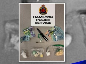 A weapon, drugs and cash seized by Hamilton Police.