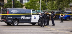 Toronto Police are seen in the parking lot at a shopping plaza on Parkway Forest Dr. in North York, which was the scene of a fatal stabbing on Thursday, July 17, 2025. ERNEST DOROSZUK/TORONTO SUN