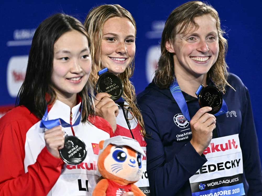 Summer McIntosh wins first gold medal at worlds in her quest for five |  Toronto Sun