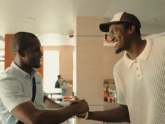 Indiana Pacers' Pascal Siakam (right) shakes hands with a man during a recent trip to Grenada.