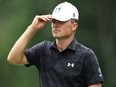 Jordan Spieth looks on from the ninth green during the first round of the Wyndham Championship at Sedgefield Country Club on July 31, 2025.