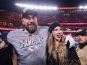 Taylor Swift celebrates with Travis Kelce #87 of the Kansas City Chiefs after defeating the Buffalo Bills 32-29 in the AFC Championship Game at GEHA Field at Arrowhead Stadium on January 26, 2025 in Kansas City, Missouri.
