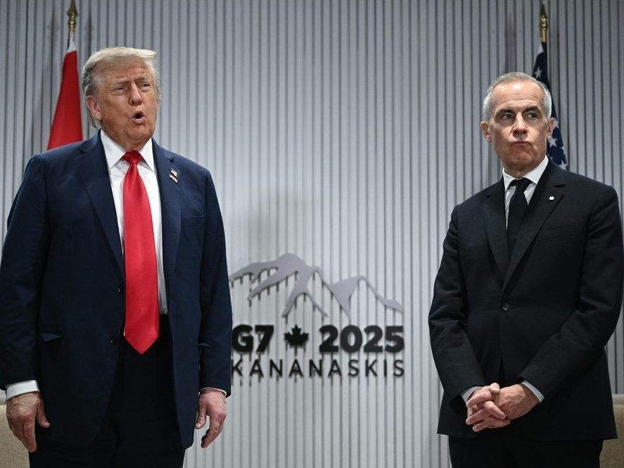 US President Donald Trump speaks to the press as Canadian Prime Minister Mark Carney looks on as they meet during the Group of Seven (G7) Summit at the Pomeroy Kananaskis Mountain Lodge in Kananaskis, Alberta, Canada on June 16, 2025. 