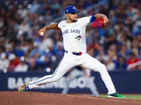 José Berríos winds up to throw a pitch.