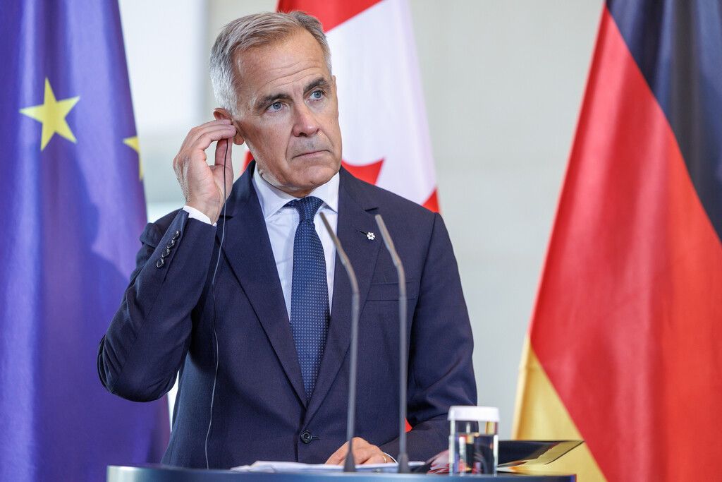 Prime Minister Mark Carney speaks to the media following talks at the Chancellery on Aug. 26, 2025 in Berlin, Germany.  