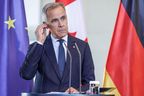Prime Minister Mark Carney speaks to the media following talks at the Chancellery on Aug. 26, 2025 in Berlin, Germany.