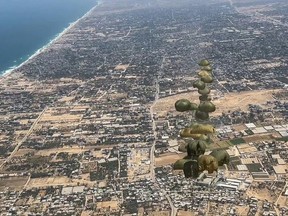 International militaries, this photo was taken by the Spanish air force and distributed to media, have flown airdrop air flights over the devastated territory