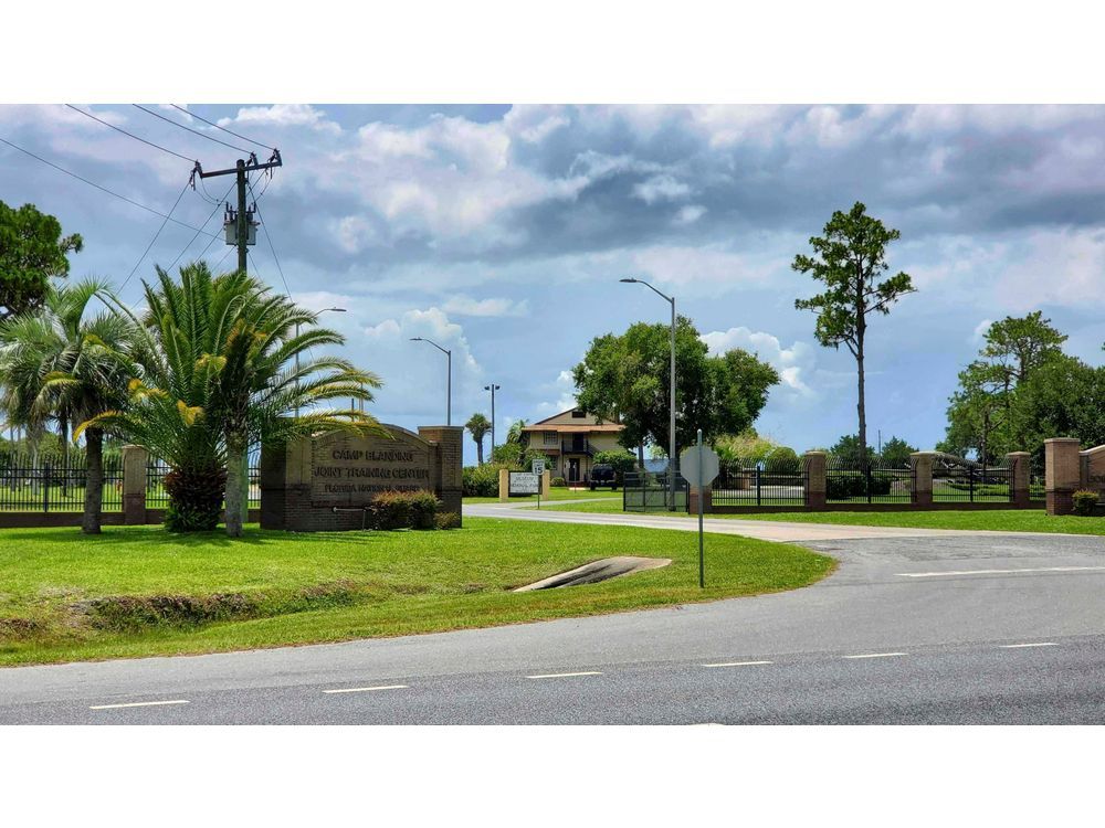 FILE - A sign marks the entrance to Camp Blanding Joint Training Center, a site used by the Florida National Guard, near Starke, Fla., July 15, 2025.