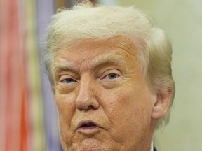 U.S. President Donald Trump makes an announcement about Apple in the Oval Office in Washington on Wednesday, Aug. 6, 2025.