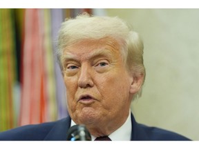 U.S. President Donald Trump makes an announcement about Apple in the Oval Office in Washington on Wednesday, Aug. 6, 2025.