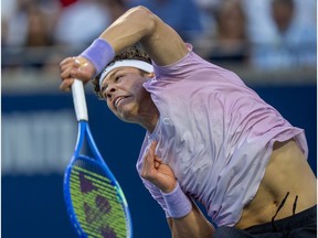 Ben Shelton of the USA serves to Karen Khachanov of Russia in the final at the National Bank Open in Toronto, Thursday, Aug. 7, 2025.
