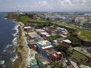 FILE - An aerial view of the seaside neighborhood of La Perla, in San Juan, Puerto Rico, is seen on Aug. 25, 2017.