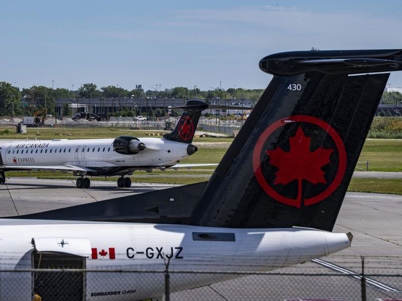An Air Canada plane gets a pushback from its gate at Montreal-Pierre Elliott Trudeau International Airport in Dorval, Que., on Tuesday, Aug. 19, 2025.