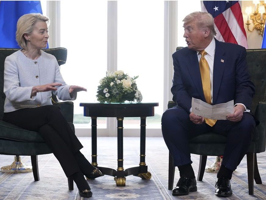 U.S. President Donald Trump and European Commission President Ursula von der Leyen talk after reaching a trade deal at the Trump Turnberry golf course in Turnberry, Scotland Sunday, July 27, 2025.