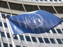 FILE - In this June 7, 2021, file photo, the flag of the International Atomic Energy Agency (IAEA) waves at the entrance of the Vienna International Center in Vienna.