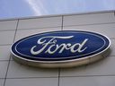 FILE - The Ford logo is seen above the entrance to the Ford Motor Company Kentucky Truck Plant, April 30, 2025, in Louisville, Ky.