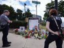 A memorial is seen in the aftermath of a shooting near the CDC where DeKalb County Police Officer David Rose was killed while responding, Wednesday, Aug. 13, 2025, in Atlanta.