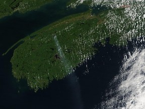 Satellite image with a trail of smoke from the Long Lake wildfire in Nova Scotia.