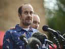 Jesse Merkel, father of Fletcher Merkel, who was killed during a school shooting at Annunciation Catholic Church, speaks during a press conference outside the church on Thursday, Aug. 28, 2025, in Minneapolis.